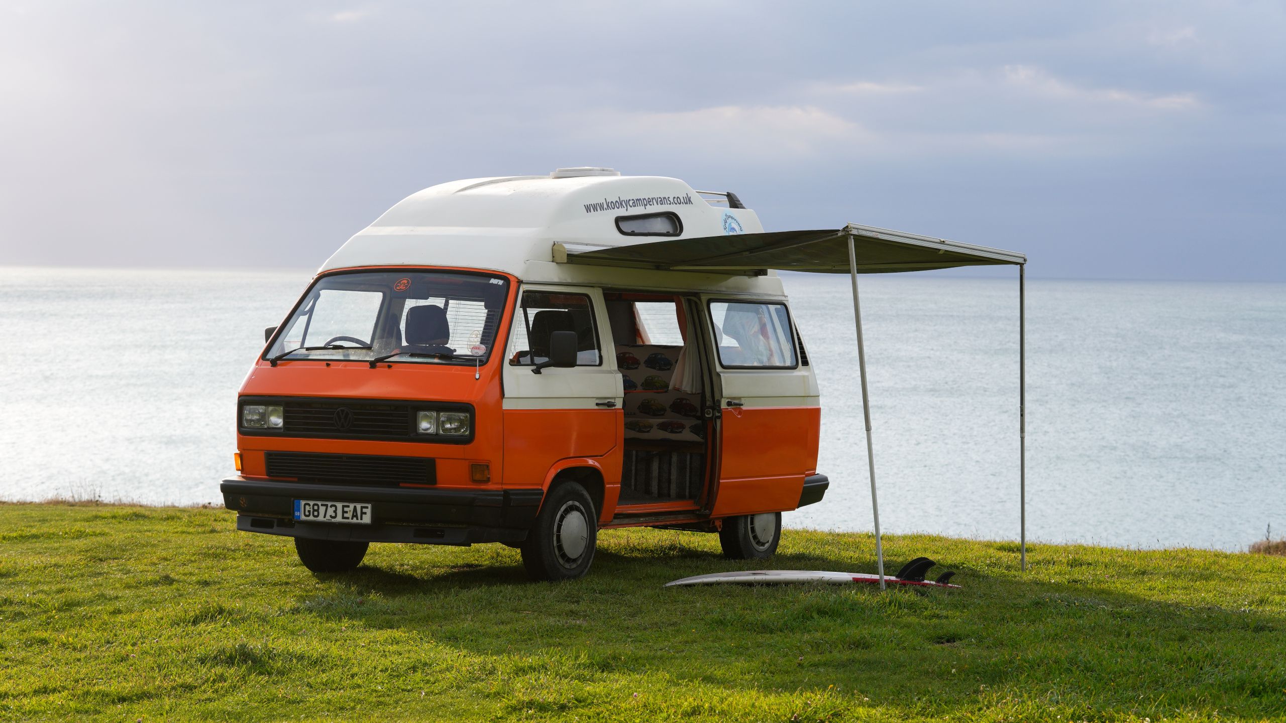 Trudi the vw campervan with surfboard 